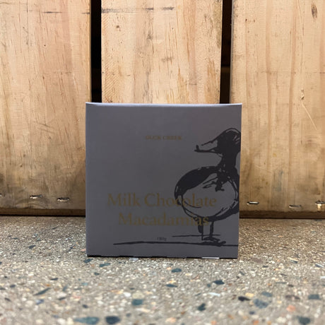 Duck Creek Chocolate Coated Macadamias Varieties Packet 180g milk chocolate available at The Prickly Pineapple